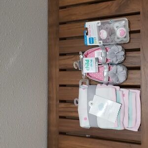 Carter's infant ballet flats, MAM 2-pack pacifiers, and 6-pack washcloths bundle